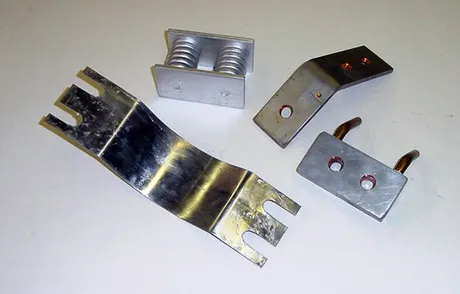 Upton replacement and spare parts laid out on a bench