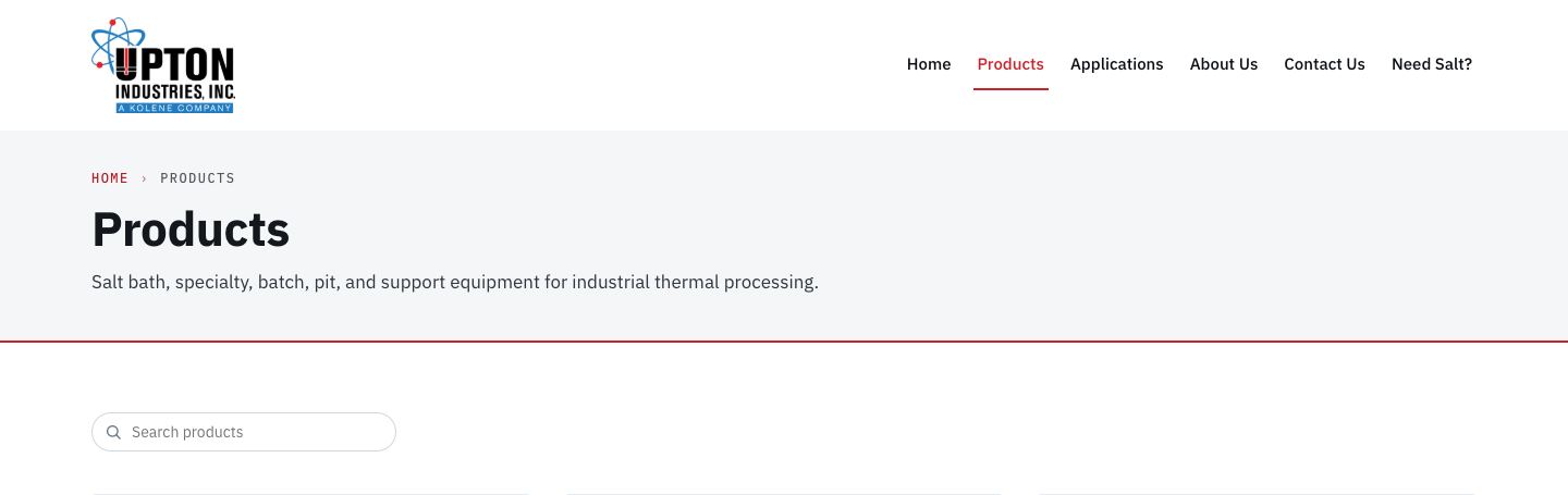 Screenshot of upton.test today (/products/ · 1440 · page header and nav). Red is the label ink (breadcrumb, nav underline, header rule) and nothing on the page reads as heat.