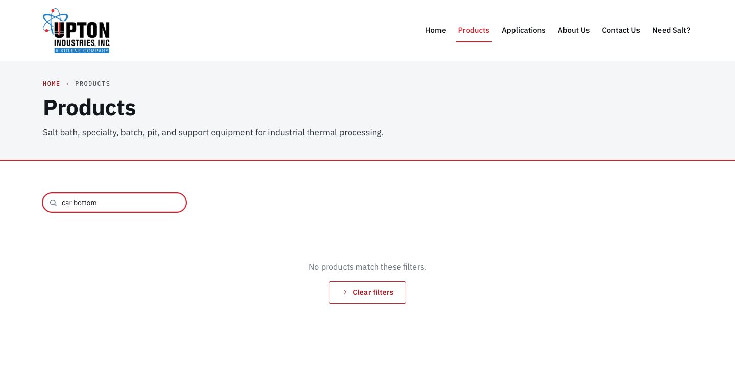 Screenshot of upton.test today (/products/ · 1440). Searching "car bottom" (a real Upton product) dead-ends at "No products match these filters." with a Clear filters button on a page with no filters.
